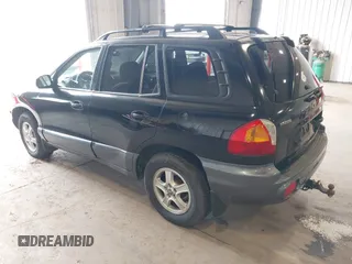 2004 Hyundai Santa Fe GLS with VIN KM8SC73D34U659949, listed as a IAAI auction lot 42111322 with 205,309 mi miles. Bid and sale history available at carsss.com. Image 3.