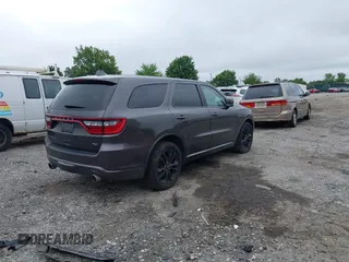 2020 Dodge Durango R/T with VIN 1C4SDJCT2LC346952, listed as a IAAI auction lot 42451221 with 65,696 mi miles and . Bid and sale history available at DreamBid. Image 4.