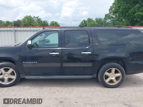 2011 Chevrolet Suburban LT with VIN 1GNSCJE07BR128885, listed as a IAAI auction lot 42456748 with 201,789 mi miles and . Bid and sale history available at DreamBid. Image 14.