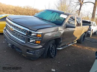 2015 Chevrolet Silverado 1500 LT with VIN 3GCUKREC8FG201619, listed as a IAAI auction lot 41853656 with 147,554 mi miles. Bid and sale history available at carsss.com. Image 2.