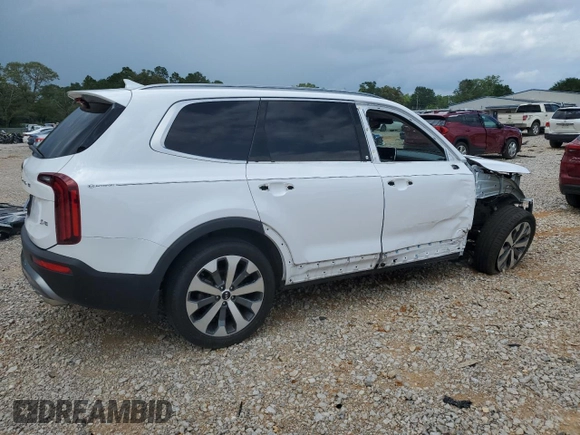 2021 Kia Telluride S with VIN 5XYP6DHC1MG156986, listed as a Copart auction lot 57964545 with 94,541 mi miles and Salvage title. Bid and sale history available at DreamBid. Image 3.