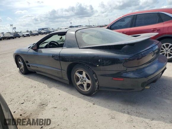 2000 Pontiac Firebird Formula z VIN 2G2FV22G9Y2140113, wystawiony jako Copart lot #76135324 z przebiegiem Nie podano mil oraz Szkoda całkowita • Salvage title. Historia ofert i sprzedaży dostępna na DreamBid. Obrazek 2.