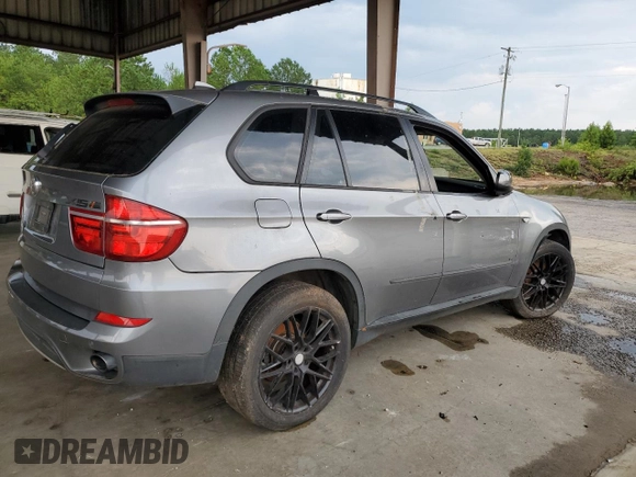 2012 BMW X5 35i with VIN 5UXZV4C56CL889802, listed as a Copart auction lot 62302265 with Not provided miles and Clean title. Bid and sale history available at DreamBid. Image 3.