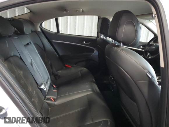 2023 Genesis G70 2.0T with VIN KMTG34TAXPU128221, listed as a Copart auction lot 71105154 with 43,626 mi miles and Non Repairable. Bid and sale history available at DreamBid. Image 10.