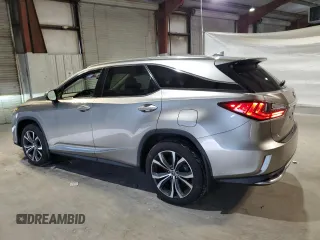 2020 Lexus RX 350L with VIN JTJHZKFA7L2024953, listed as a Copart auction lot 85044234 with 60,874 mi miles and Salvage title. Bid and sale history available at DreamBid. Image 2.