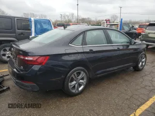 2023 Volkswagen Jetta SE с VIN 3VW7M7BUXPM047875, выставлен на аукционе Copart как лот 53743505 с пробегом 50 420 миль миль и На запчасти • Non repairable. История ставок и продаж доступна на DreamBid. Изображение 3.