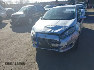 2017 Ford Fiesta SE z VIN 3FADP4BJXHM143658, wystawiony jako IAAI lot #41693045 z przebiegiem 142 361 mil mil oraz . Historia ofert i sprzedaży dostępna na DreamBid. Obrazek 6.
