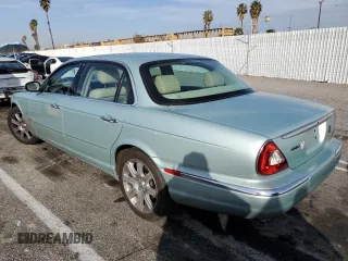 2005 Jaguar XJ with VIN SAJWA79C15SG47018, listed as a Copart auction lot 43087185 with 31,725 mi miles and Salvage Title. Bid and sale history available at carsss.com. Image 2.