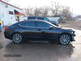 2015 Acura TLX Advance z VIN 19UUB3F72FA010258, wystawiony jako IAAI lot #41208796 z przebiegiem 158 125 mil mil oraz . Historia ofert i sprzedaży dostępna na DreamBid. Obrazek 14.