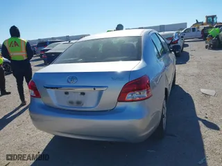 2012 Toyota Yaris with VIN JTDBT4K35CL038860, listed as a IAAI auction lot 41254384 with 161,536 mi miles. Bid and sale history available at carsss.com. Image 4.