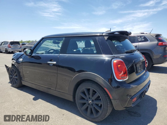 2017 MINI Hardtop Cooper S with VIN WMWXP7C52H2A44625, listed as a Copart auction lot 58011895 with 79,238 mi miles and Salvage title. Bid and sale history available at DreamBid. Image 2.