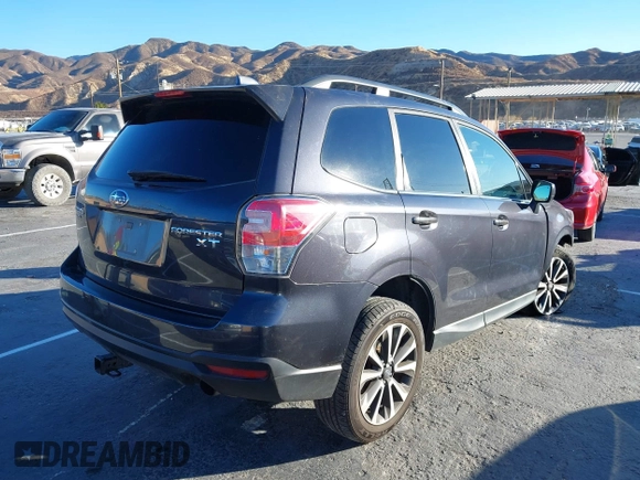 2018 Subaru Forester Premium with VIN JF2SJGEC4JH550243, listed as a IAAI auction lot 41344962 with 65,536 mi miles. Bid and sale history available at carsss.com. Image 4.