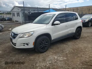 2011 Volkswagen Tiguan SEL w/Premium Navi z VIN WVGAV7AX6BW521178, wystawiony jako Copart lot #56135045 z przebiegiem 155 438 mil mil oraz Czysty tytuł • Clean title. Historia ofert i sprzedaży dostępna na DreamBid. Obrazek 1.