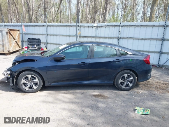 2021 Honda Civic LX z VIN 19XFC2F65ME000324, wystawiony jako IAAI lot #42137375 z przebiegiem 78 473 mil mil oraz . Historia ofert i sprzedaży dostępna na DreamBid. Obrazek 14.
