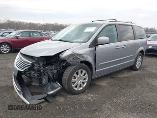 2014 Chrysler Town & Country Touring with VIN 2C4RC1BG1ER343069, listed as a IAAI auction lot 41683253 with 137,978 mi miles and . Bid and sale history available at DreamBid. Image 2.