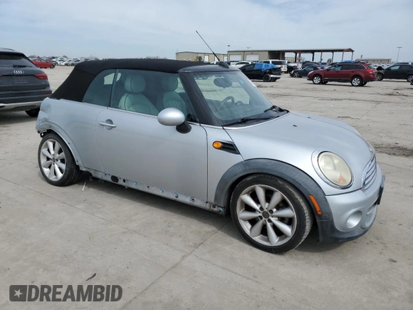 2011 MINI Convertible with VIN WMWZN3C53BTZ89332, listed as a Copart auction lot 45945515 with 25,809 mi miles and Salvage title. Bid and sale history available at DreamBid. Image 4.