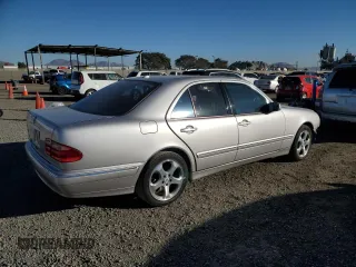 2002 Mercedes-Benz E-Class with VIN WDBJF65J82B478924, listed as a Copart auction lot 87767635 with 154,377 mi miles and Salvage Title. Bid and sale history available at carsss.com. Image 3.