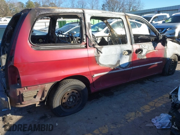 2005 Kia Sedona LX with VIN KNDUP132156730729, listed as a IAAI auction lot 41327725 with 1 mi miles. Bid and sale history available at carsss.com. Image 4.