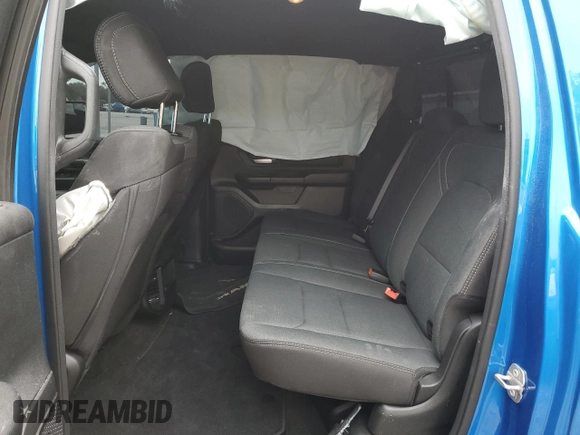 2023 Ram 1500 Tradesman with VIN 1C6SRFGT1PN666130, listed as a Copart auction lot 69990804 with 2,229 mi miles and Salvage title. Bid and sale history available at DreamBid. Image 10.