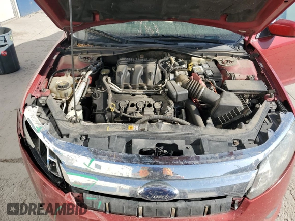 2010 Ford Fusion SE z VIN 3FAHP0HG4AR234696, wystawiony jako Copart lot #60597925 z przebiegiem 187 861 mil mil oraz Szkoda całkowita • Salvage title. Historia ofert i sprzedaży dostępna na DreamBid. Obrazek 11.