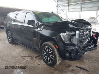 2021 GMC Yukon XL AT4 with VIN 1GKS2HKD7MR485244, listed as a IAAI auction lot 41290892 with 73,178 mi miles. Bid and sale history available at carsss.com. Image 1.
