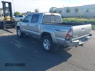 2014 Toyota Tacoma PreRunner with VIN 5TFJU4GN3EX051198, listed as a IAAI auction lot 41764088 with 126,259 mi miles. Bid and sale history available at carsss.com. Image 3.