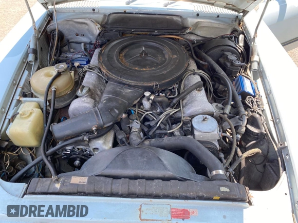 1975 Mercedes-Benz SL with VIN 10704412027415, listed as a Copart auction lot 82576724 with 105,242 mi miles and Clean title. Bid and sale history available at DreamBid. Image 7.