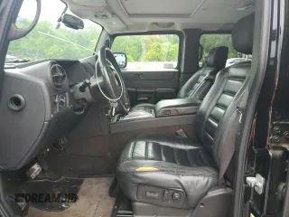 2006 Hummer H2 z VIN 5GRGN23U66H116855, wystawiony jako Copart lot #56010175 z przebiegiem 217 798 mil mil oraz Tytuł czysty. Historia ofert i sprzedaży dostępna na DreamBid. Obrazek 7.