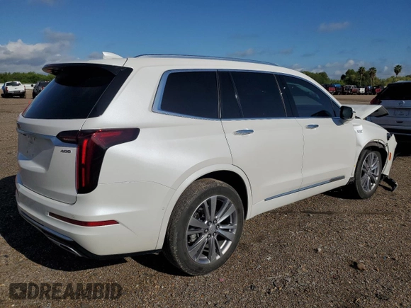 2023 Cadillac XT6 FWD Premium Luxury with VIN 1GYKPCRS5PZ120905, listed as a Copart auction lot 64374254 with 30,694 mi miles and Salvage title. Bid and sale history available at DreamBid. Image 3.