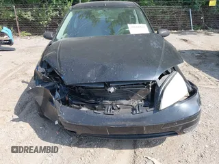 2007 Ford Focus S with VIN 1FAFP31NX7W166380, listed as a IAAI auction lot 41346001 with 179,464 mi miles and . Bid and sale history available at carsss.com. Image 6.