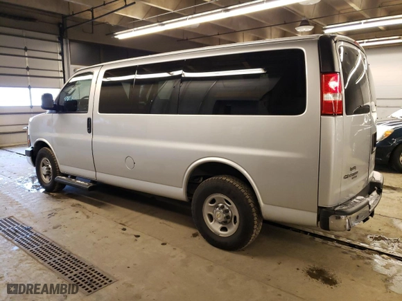 2016 Chevrolet Express Passenger LT with VIN 1GAWGFFFXG1284318, listed as a Copart auction lot 77784123 with 71,042 mi miles. Bid and sale history available at carsss.com. Image 2.