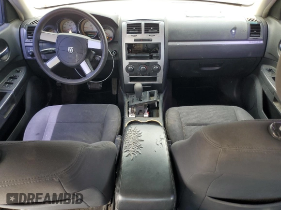 2010 Dodge Charger SXT with VIN 2B3CA3CV5AH185969, listed as a Copart auction lot 55684185 with 138,384 mi miles and Salvage Title. Bid and sale history available at DreamBid. Image 8.