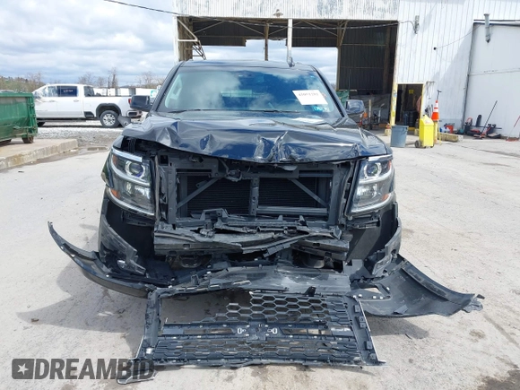 2017 Chevrolet Tahoe LT with VIN 1GNSKBKC5HR233537, listed as a IAAI auction lot 42051281 with 102,778 mi miles and . Bid and sale history available at DreamBid. Image 12.