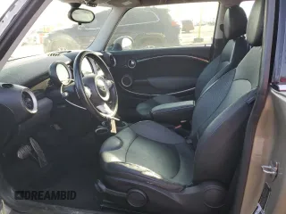 2009 MINI Hardtop S with VIN WMWMF73529TW82713, listed as a Copart auction lot 51152035 with 170,954 mi miles and Salvage title. Bid and sale history available at DreamBid. Image 7.