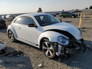 2016 Volkswagen Beetle Turbo R-Line with VIN 3VWVT7AT9GM602303, listed as a Copart auction lot 63845354 with 65,796 mi miles and Salvage Title. Bid and sale history available at DreamBid. Image 4.