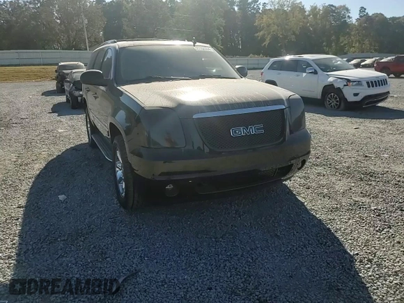 2011 GMC Yukon Denali with VIN 1GKS1EEFXBR121055, listed as a Copart auction lot 77194354 with 98,806 mi miles and Salvage Title. Bid and sale history available at carsss.com. Image 11.