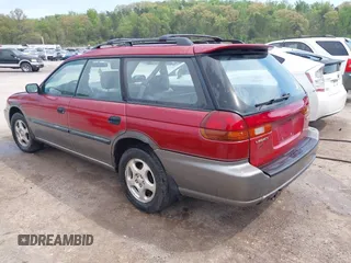 1996 Subaru Legacy Outback with VIN 4S3BG6857T7972309, listed as a IAAI auction lot 41971880 with 94,650 mi miles and . Bid and sale history available at DreamBid. Image 3.
