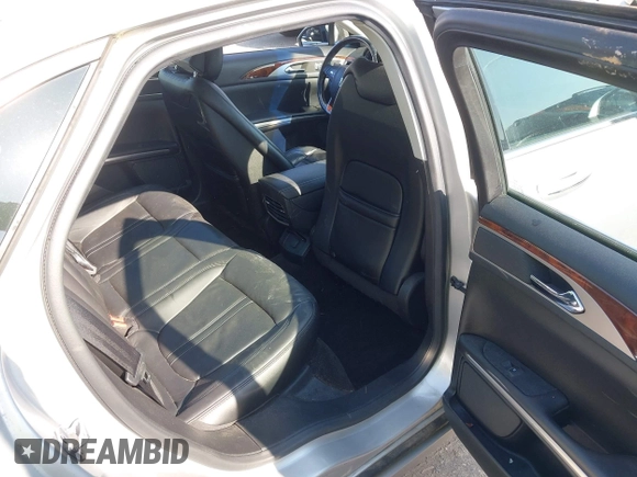 2015 Lincoln MKZ with VIN 3LN6L2G94FR608299, listed as a IAAI auction lot 42103338 with 96,955 mi miles and . Bid and sale history available at DreamBid. Image 8.