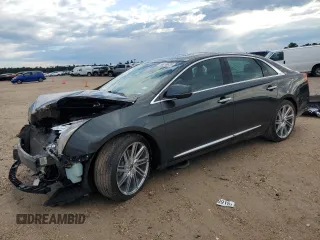 2013 Cadillac XTS Luxury z VIN 2G61P5S33D9217027, wystawiony jako Copart lot #56358835 z przebiegiem 82 644 mil mil oraz Szkoda całkowita • Salvage title. Historia ofert i sprzedaży dostępna na DreamBid. Obrazek 1.