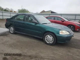 1999 Honda Civic VP z VIN 2HGEJ6619XH585514, wystawiony jako Copart lot #55683885 z przebiegiem 76 596 mil mil oraz Szkoda całkowita • Salvage title. Historia ofert i sprzedaży dostępna na DreamBid. Obrazek 4.