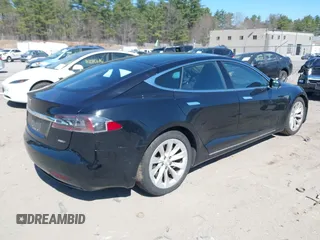 2016 Tesla Model S 90D with VIN 5YJSA1E21GF140740, listed as a IAAI auction lot 42062461 with 237,943 mi miles and . Bid and sale history available at DreamBid. Image 4.