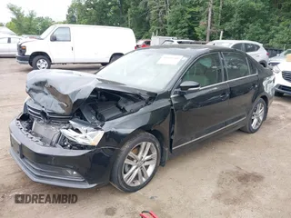 2017 Volkswagen Jetta SEL z VIN 3VWL17AJ1HM406515, wystawiony jako IAAI lot #42660560 z przebiegiem 88 253 mil mil oraz . Historia ofert i sprzedaży dostępna na DreamBid. Obrazek 2.