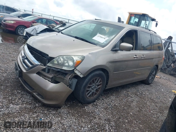 2007 Honda Odyssey EX-L z VIN 5FNRL38717B102646, wystawiony jako IAAI lot #42380196 z przebiegiem 234 088 mil mil oraz . Historia ofert i sprzedaży dostępna na DreamBid. Obrazek 2.