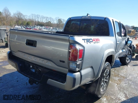 2023 Toyota Tacoma 4WD SR with VIN 3TYCZ5AN7PT122067, listed as a IAAI auction lot 41624047 with 27,483 mi miles. Bid and sale history available at carsss.com. Image 4.