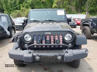 2015 Jeep Wrangler Unlimited Sahara with VIN 1C4HJWEG3FL661568, listed as a IAAI auction lot 42387810 with 140,927 mi miles and . Bid and sale history available at DreamBid. Image 12.