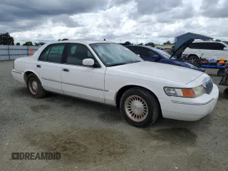 2000 Mercury Grand Marquis LS с VIN 2MEFM75W8YX736085, выставлен на аукционе Copart как лот 56324755 с пробегом 178 888 миль миль и Чистый • Clean title. История ставок и продаж доступна на DreamBid. Изображение 4.