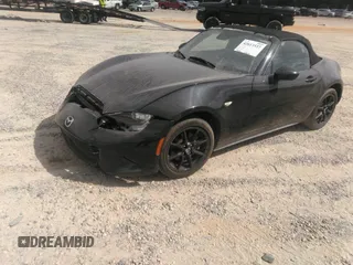 2021 Mazda MX-5 Miata Sport with VIN JM1NDAB73M0454064, listed as a IAAI auction lot 42613537 with 24,630 mi miles and . Bid and sale history available at DreamBid. Image 2.
