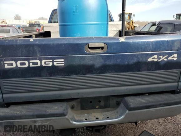 2000 Dodge 2500 with VIN 3B7KF2362YG132087, listed as a Copart auction lot 48668925 with 358,326 mi miles and Salvage title. Bid and sale history available at DreamBid. Image 6.