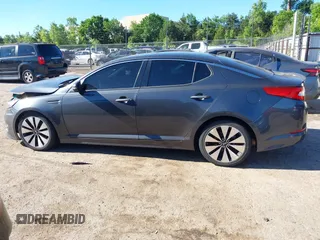 2011 Kia Optima SX z VIN KNAGR4A60B5126988, wystawiony jako IAAI lot #42313244 z przebiegiem 152 661 mil mil oraz . Historia ofert i sprzedaży dostępna na DreamBid. Obrazek 14.