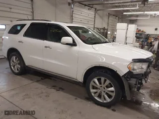 2013 Dodge Durango Crew with VIN 1C4SDJDT1DC540680, listed as a IAAI auction lot 41649262 with 106,016 mi miles. Bid and sale history available at carsss.com. Image 1.